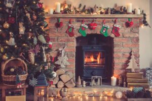 lit fireplace with Christmas decoration